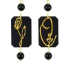Orecchini Viso E Fiore Mini Pois Plexi Nero